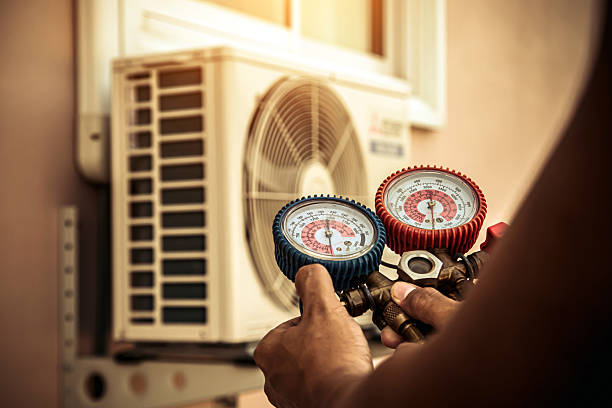 Professional Air Conditioning Service technician working in Joppa, IL